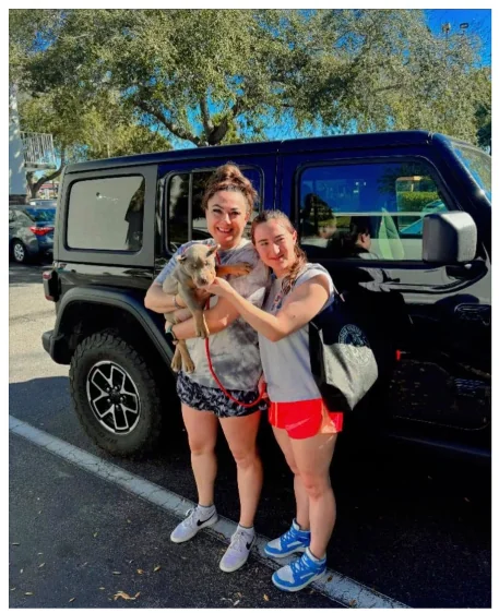Happy customer with their new puppy from Pocket XL Bullies